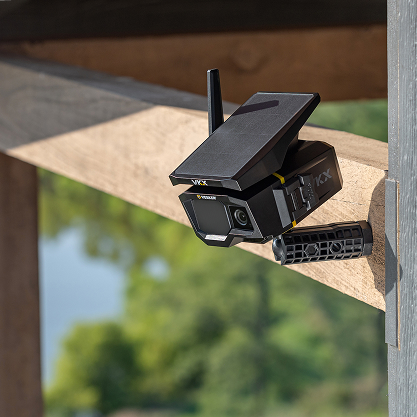 VKX camera mounted on a wood beam overlooking greenery